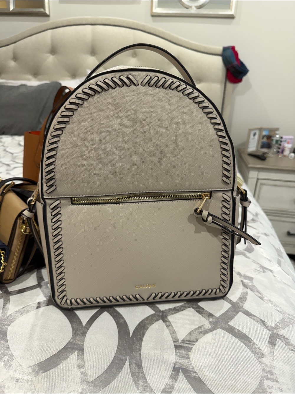 Calvin Klein Cream Whipstitch Mini Backpack